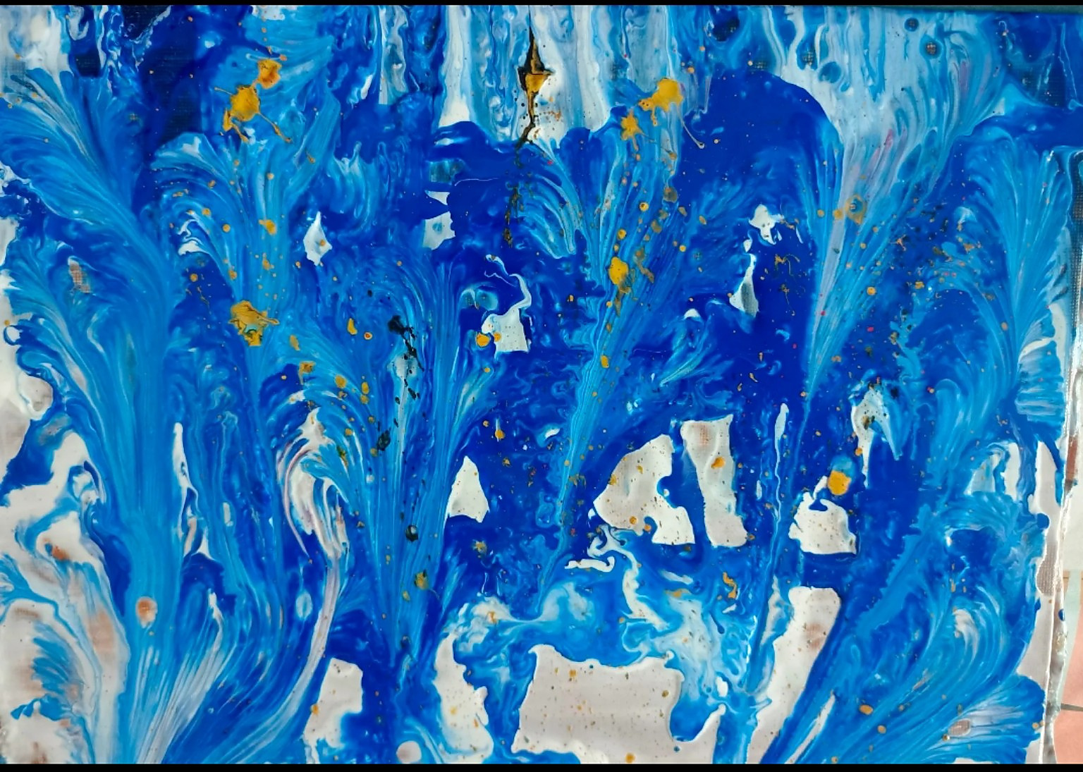 Abstract acrylic painting in cobalt and turquoise blue, with sweeping white currents and scattered gold accents.