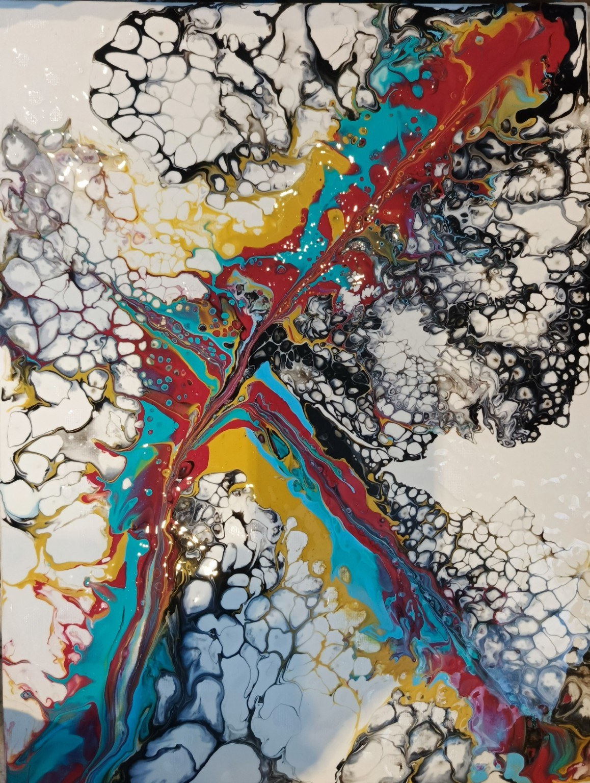 Abstract acrylic painting with bold streams of turquoise, red and yellow cutting through intricate black, white and grey cellular patterns, creating an energetic, electric sense of movement.